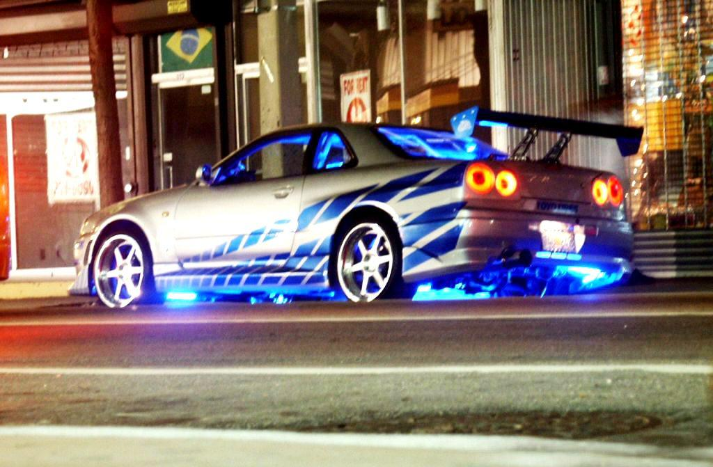 Skyline fast furious 2. Nissan Skyline GTR r34 Форсаж 2. Nissan Skyline 34 пола Уокера. Скайлайн Форсаж 2. Skyline r34 пол Уокер.