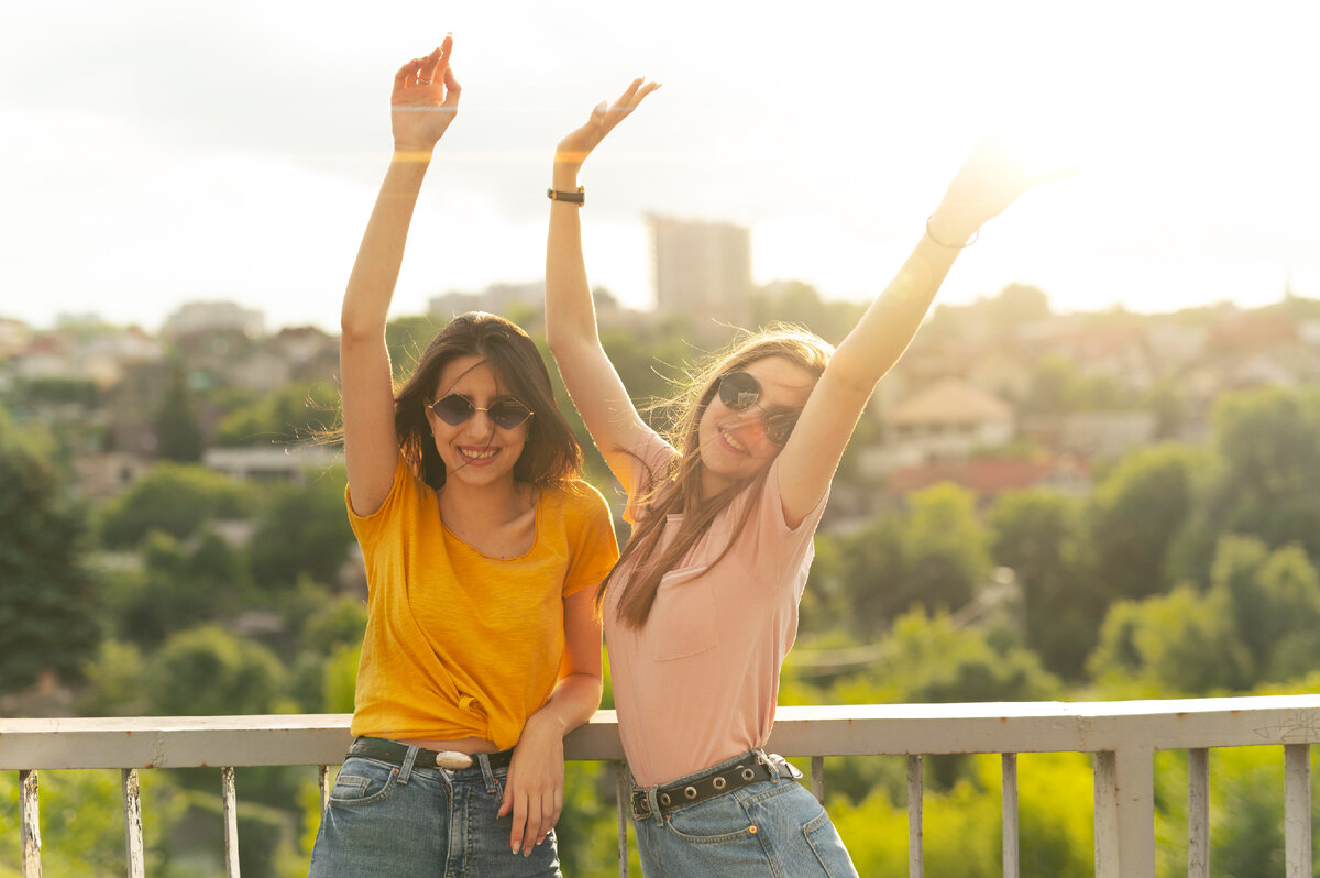 Sunshine friends. Two friends spending time.