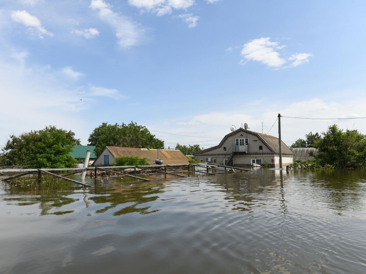    Садовые участки в населенном пункте Корсунка, затопленные в результате разрушения Каховской ГЭС© РИА Новости / Таисия Воронцова