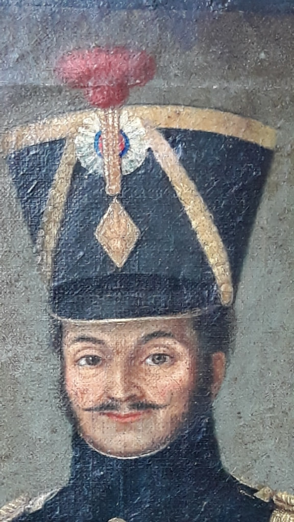 Фрагмент картины. На киверной бляхе изображена гренада.