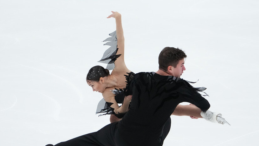     Дарья Павлюченко и Денис Ходыкин выступают с произвольной программой в парном катании на контрольных прокатах сборной России по фигурному катанию в Москве РИА Новости Александр Вильф