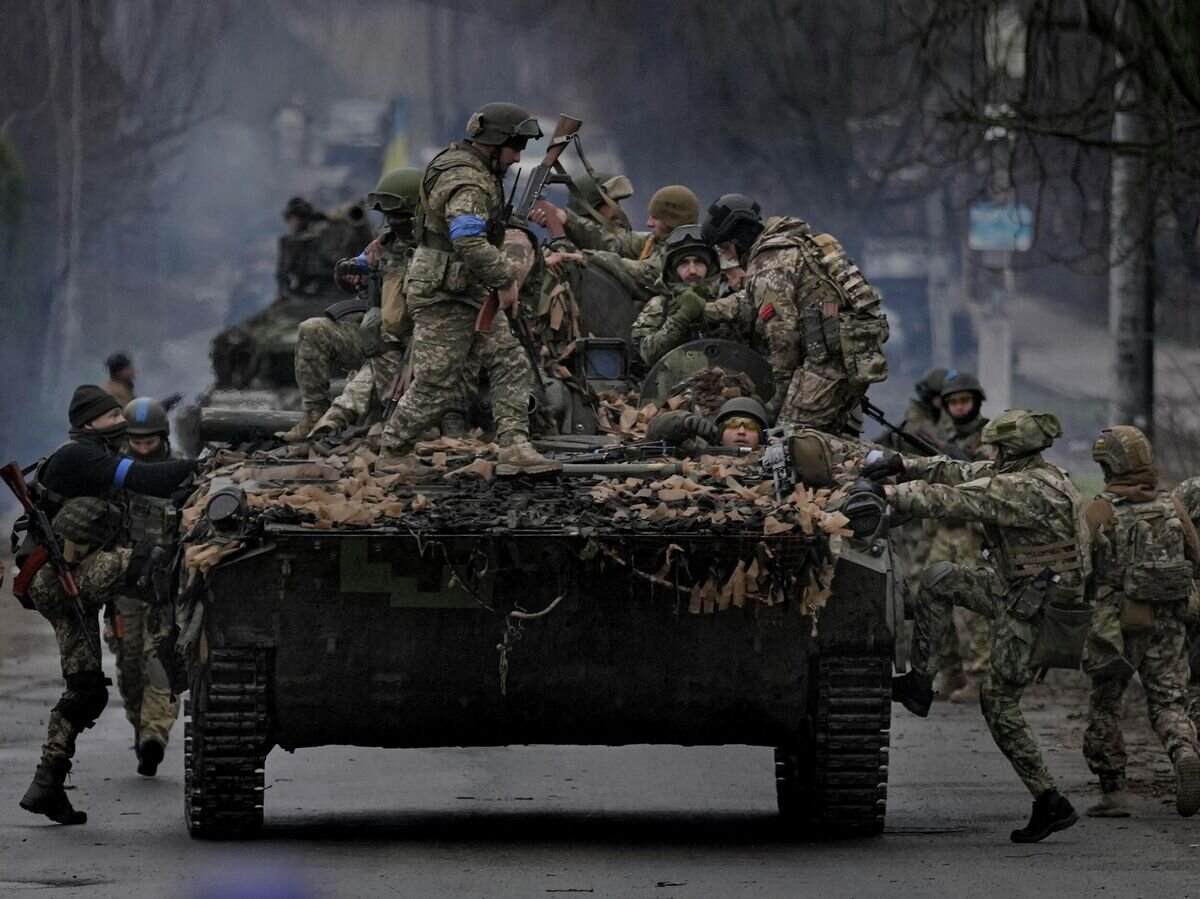    Украинские военные в городе Буча© AP Photo / Vadim Ghirda