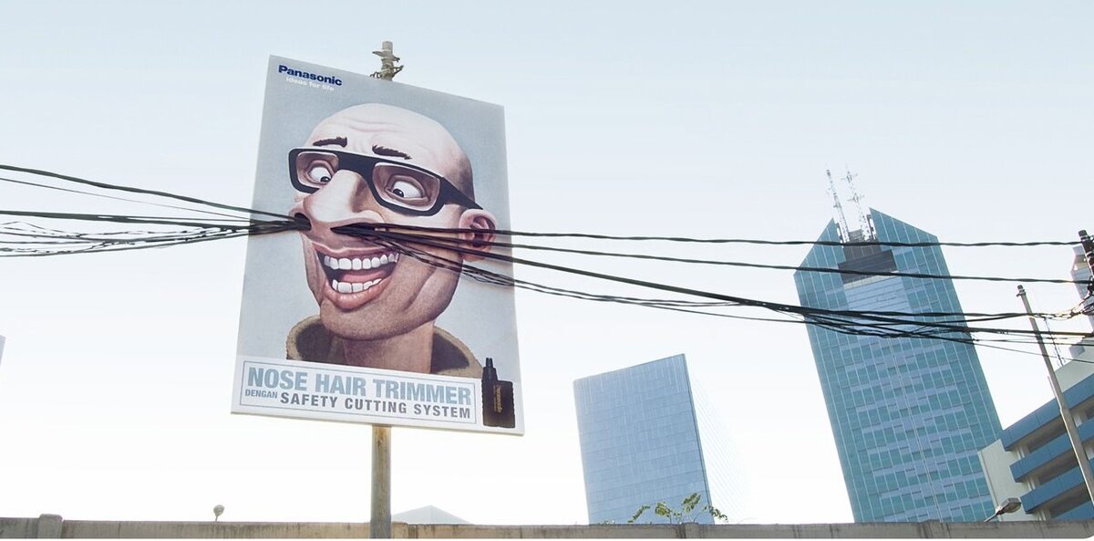 На плакате рекламируется триммер для носа. До этой рекламы не представлял, что это может быть проблемой