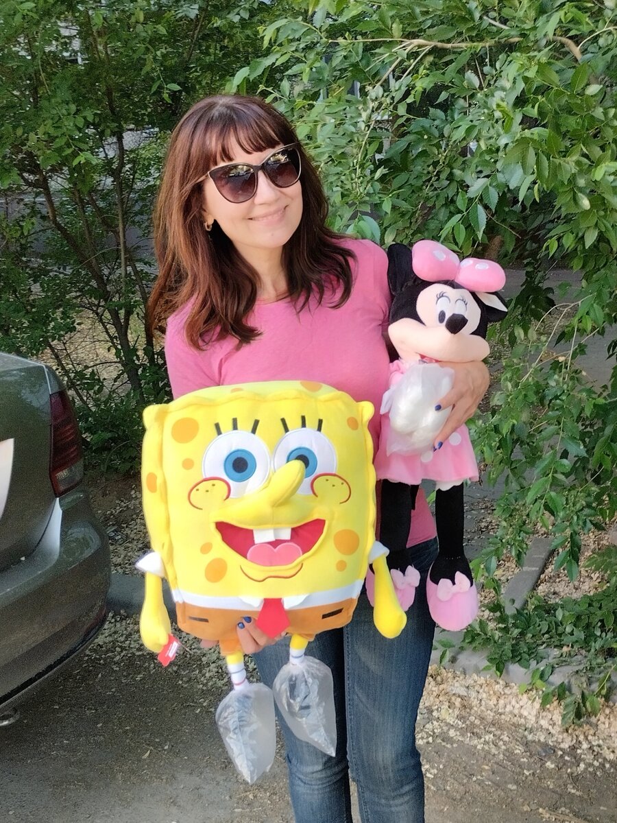 Фото автора, выигранные в тире игрушки