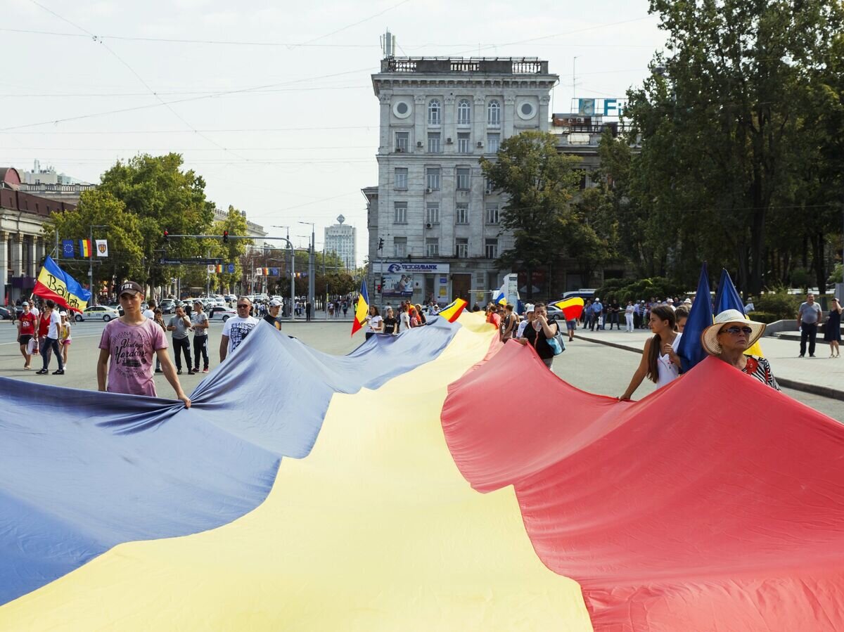    Митинг сторонников объединения Молдавии и Румынии на площади Великого национального собрания в Кишиневе. 1 сентября 2018© Sputnik / Мирослав Ротарь