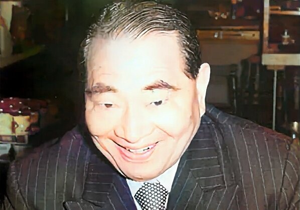 Токуиро Намикоши.