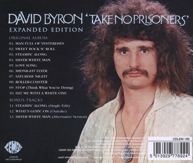 Задняя часть коробки CD-выпуска 2011 года альбома David Byron «Take No Prisoners», 1975 г., на этом выпуске представлены и бонусы, один из которых - оригинальная студийная песня 