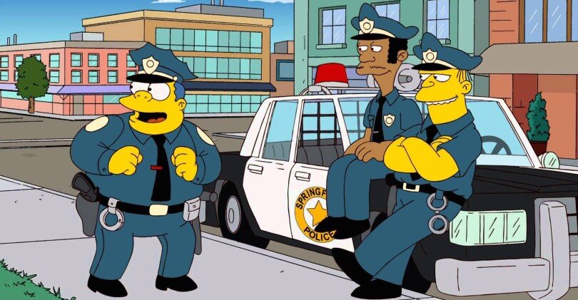 Шеф полиции (слева) в мультсериале "Симпсоны". Кадр YouTube