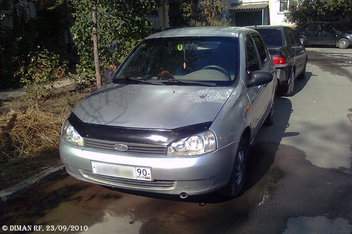 ВАЗ-11183, 2005г.в. Серебристо-жёлто-голубой.