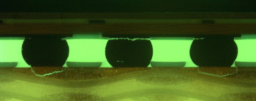 Снимок платы и процессора с трещинами в пайке