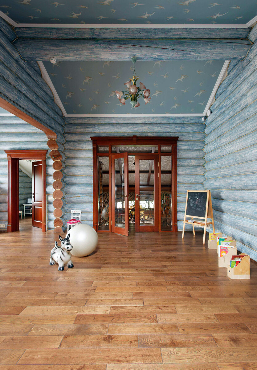 Современный стиль и теплота дома из бревна 