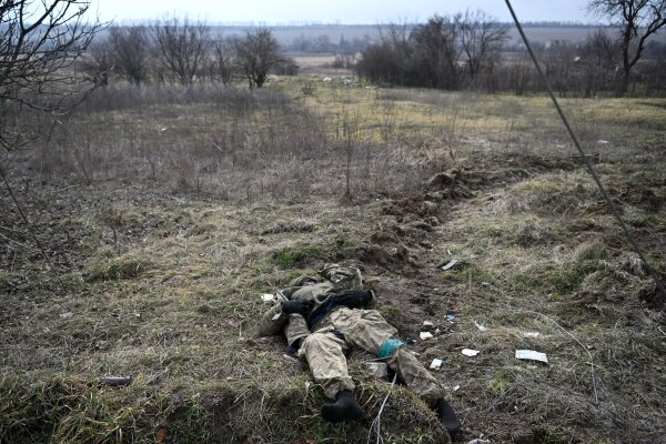 Фото: РИА Новости/Евгений Биятов. Тело бойца ВСУ в зоне СВО