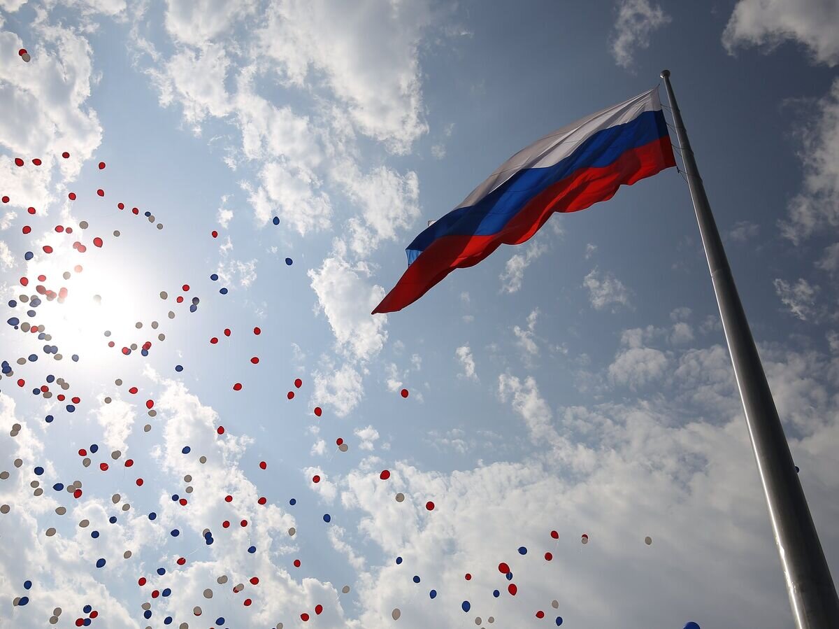    Празднование Дня Государственного флага РФ в Краснодаре© РИА Новости / Виталий Тимкив