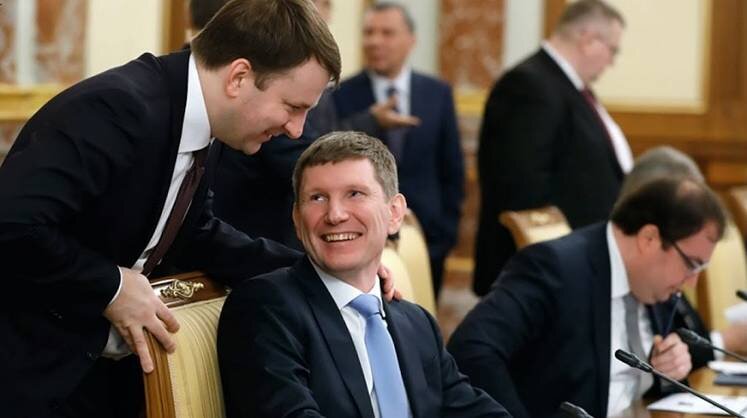    Дмитрий Астахов/POOL/ТАСС Глава Минэкономразвития Максим Решетников (в центре)