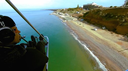 Полет на самолете Драгонфлай над морем и землей