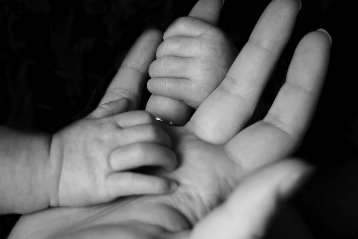 Mother's and son's hands