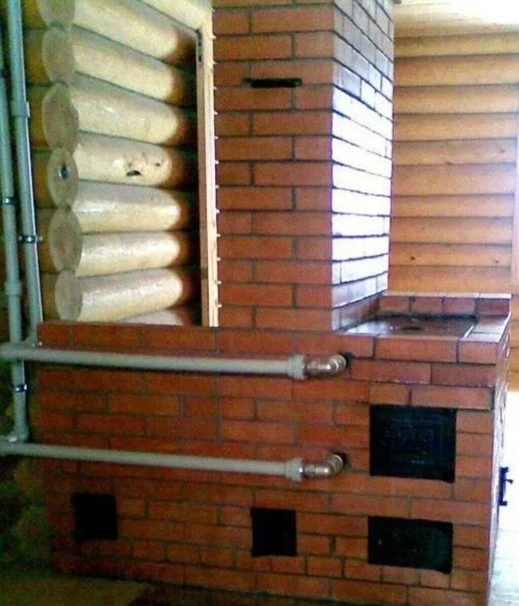 Какие есть печки. Кирпичная печь голландка с водяным контуром. Котел отопительный вмонтировать в кирпичную печь. Печь с котлом водяного отопления. Печь для парового отопления.