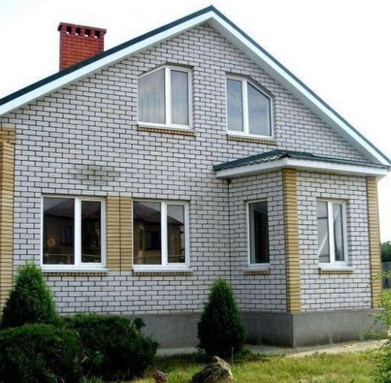 Кирпичный частный дом