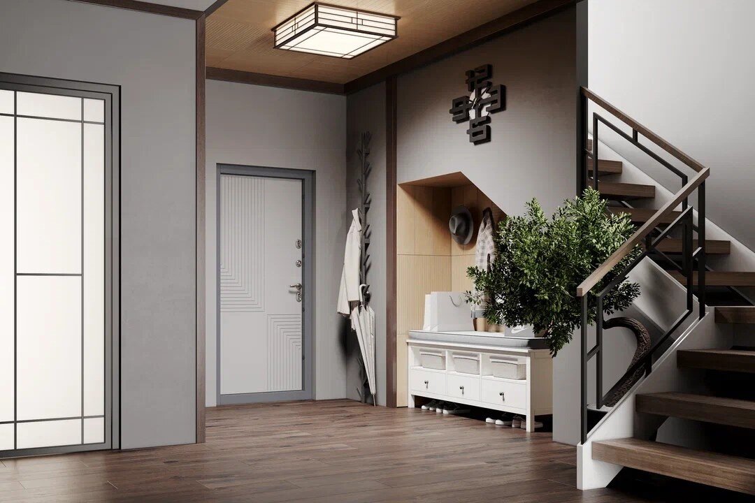 Входная дверь Snegir PRO в прихожей тепло-серого цвета