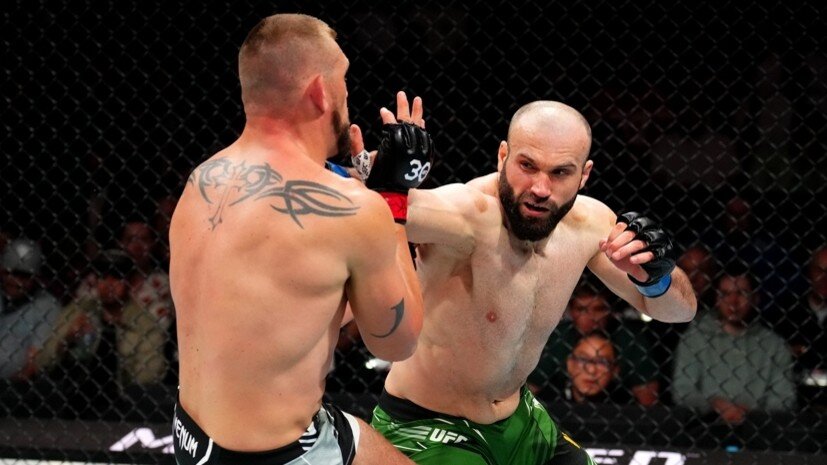     Бойцы UFC Дастин Джейкоби и Азамат Мурзаканов Gettyimages.ru Josh Hedges / Contributor