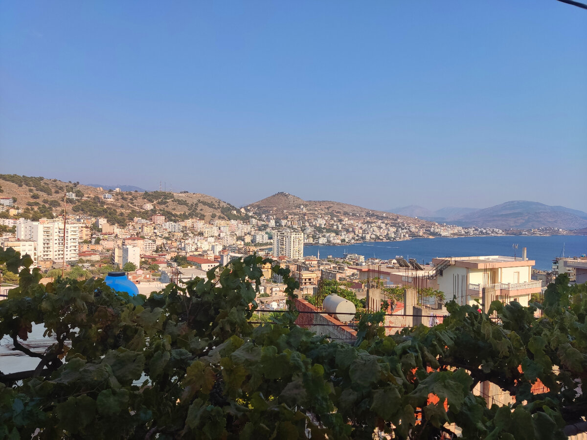 Вид с балкона на город и на остров Корфу 🇬🇷 (справа в дымке). 