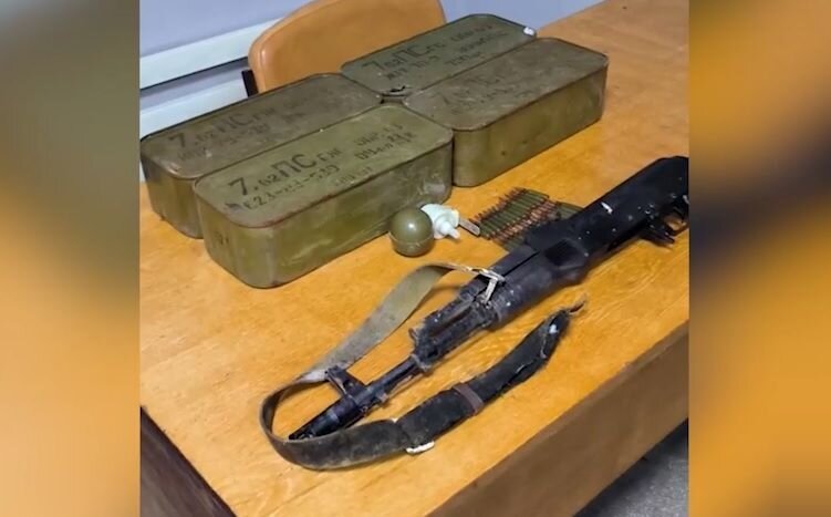    Тайник с оружием и боеприпасами Кадр из видео