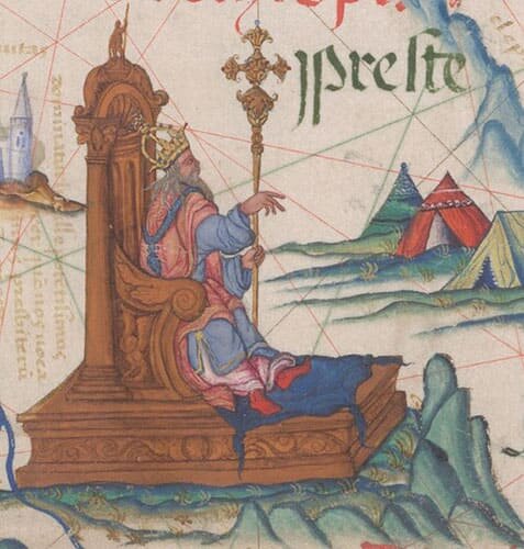 Изображение пресвитера Иоанна на троне на карте Восточной Африки. Queen Mary’s Atlas, Diogo Homem, 1558. Появление на африканском континенте объясняется тем, что точное местоположение царства царя Ивана было в Европе не известно (за исключением того, что он находится где-то в восточной стороне), поэтому разные источники помещали его и в Азии, и позднее - после неудачных поисков там - в Африке.