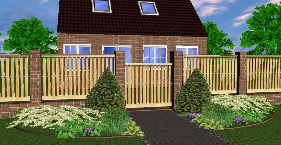 Цветник у калитки в мае