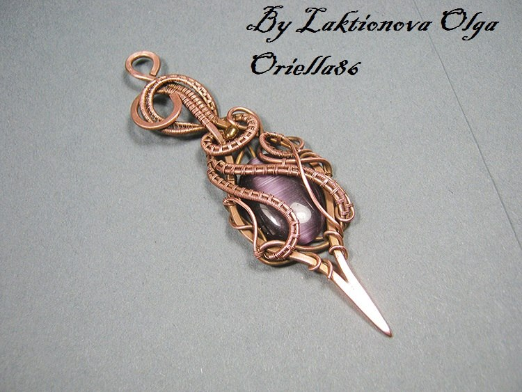 Кулон с кошачьим глазом.