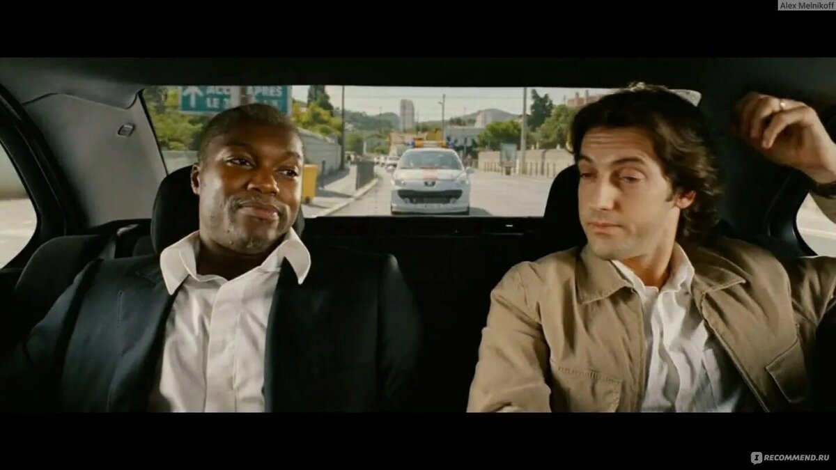 Джибриль Сиссе (слева) в фильме "Такси 4"