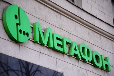    Вывеска на офисе компании "Мегафон" в Москве ©Алексей Филиппов РИА Новости