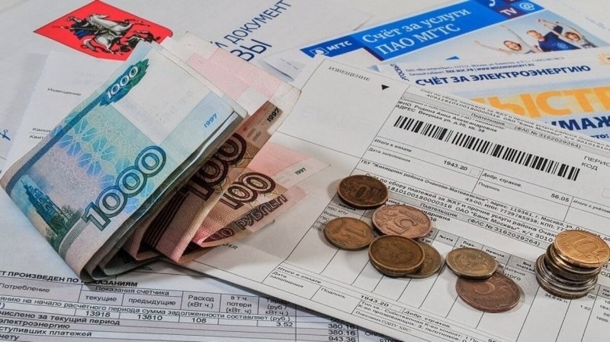    Долги россиян за ЖКУ достигли почти 900 млрд рублей