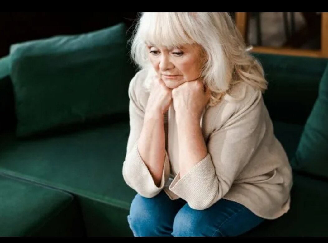 https://st3.depositphotos.com/13193658/37557/i/450/depositphotos_375578216-stock-photo-sad-elderly-woman-sitting-home.jpg