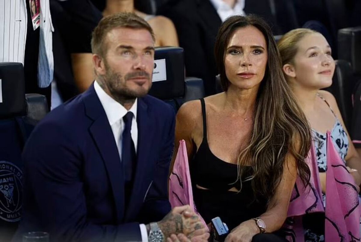    Дэвид и Виктория Бекхэм с дочкой Харпер. Фото: Daily Mail