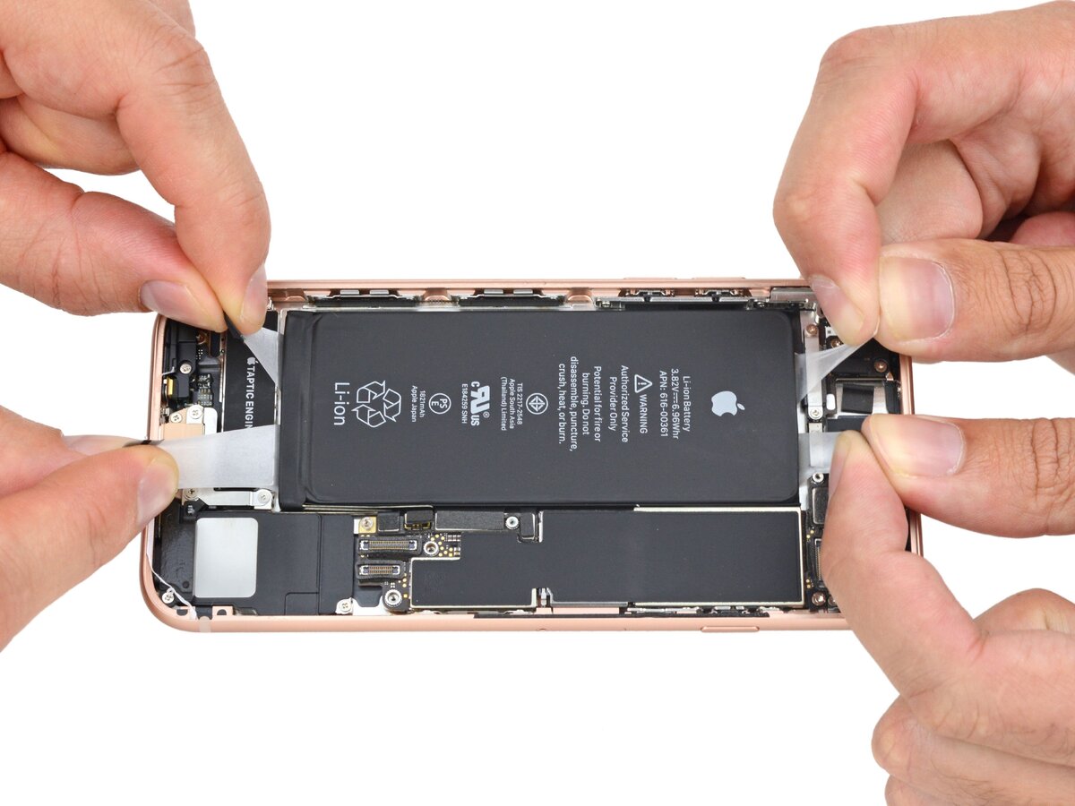 Те самые язычки клеевых лент батареи iPhone. 