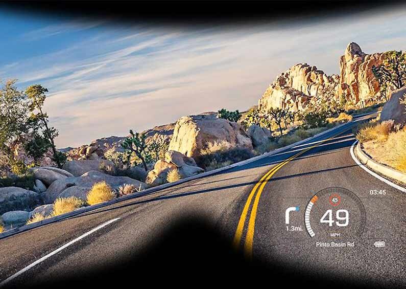 Съёмный проекционный дисплей для крепления на шлем мотоциклиста от NuViz позволяет видеть скорость, навигационную карту, слушать музыку и снимать видео. 