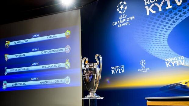 Четвертьфиналы Лиги чемпионов показаны рядом с трофеем после розыгрыша пятницы в штаб-квартире УЕФА в Ньоне, Швейцария.