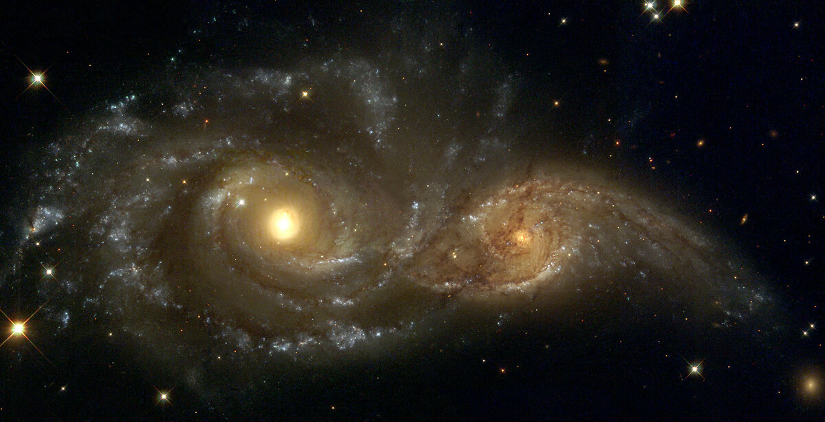 Пример столкновения галактик NGC 2207 и IC 2163